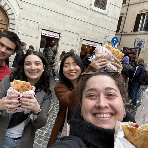 Picture of Thomas McGrath, Harper Tooch, Gloria Jin and Ela Sutcu holding sandwiches